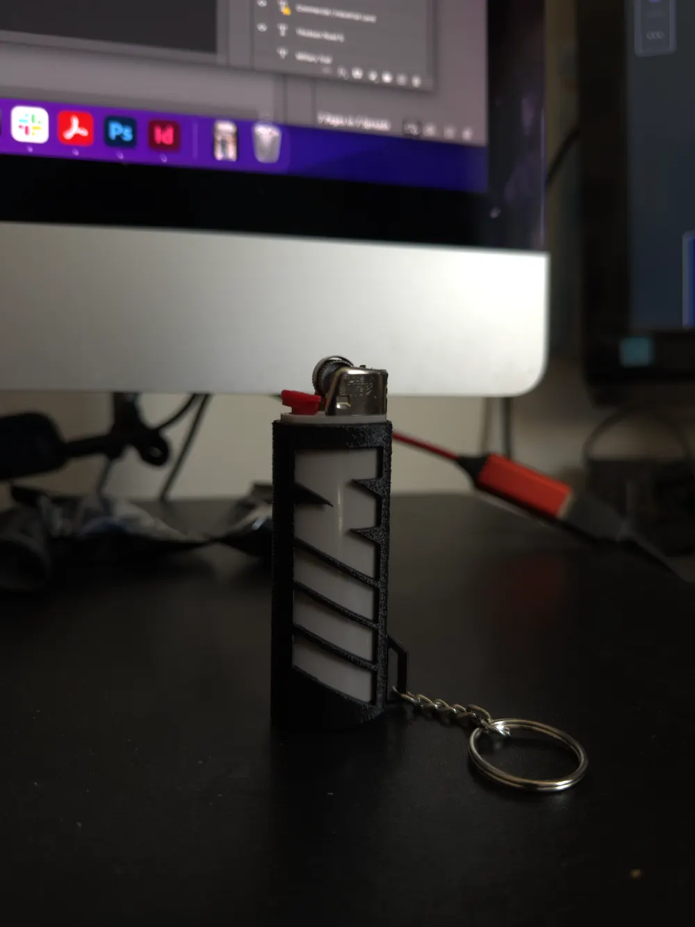 Original phone photo of the black lighter case standing upright