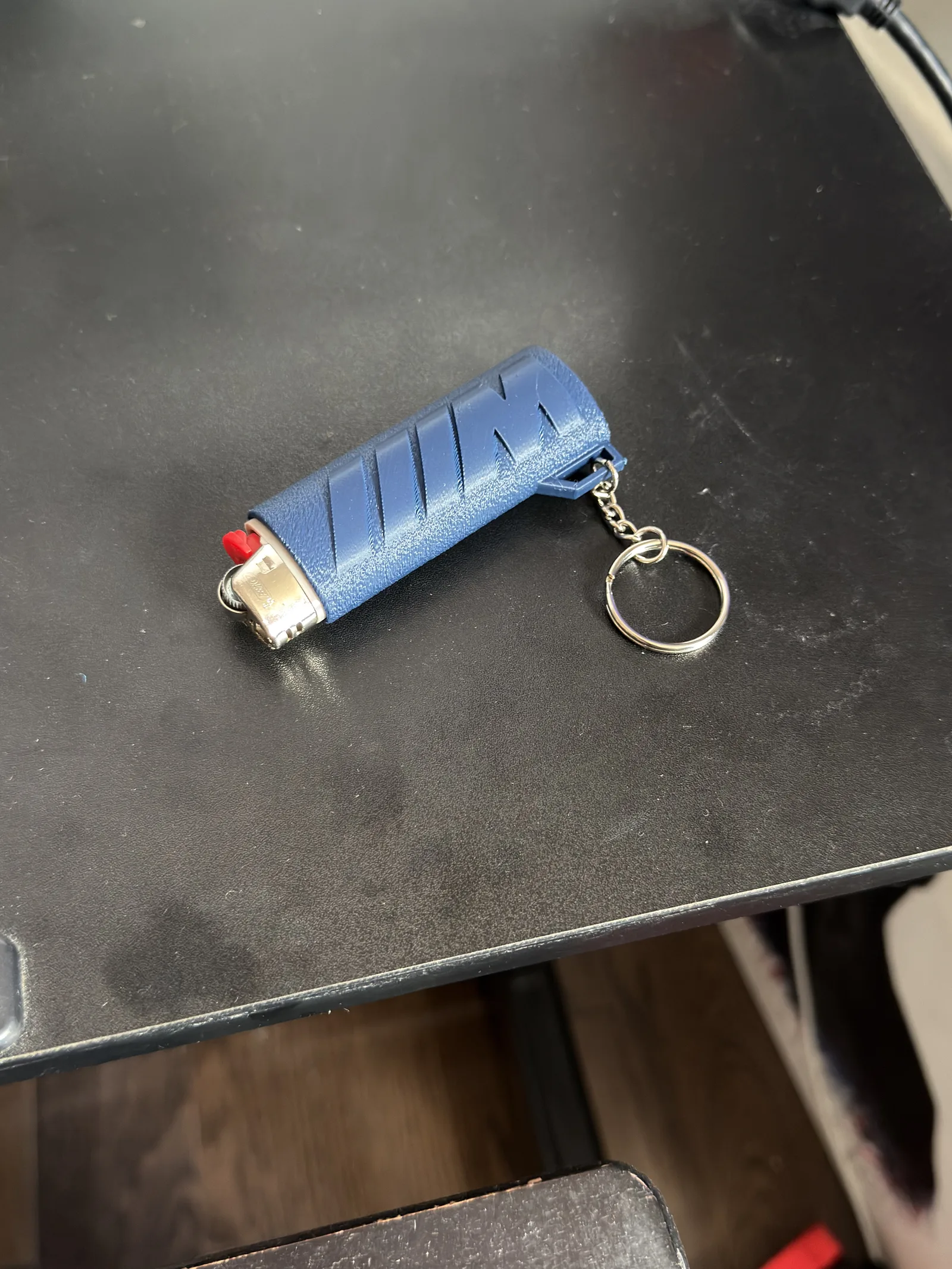 Real-world phone photo checking lighter case use and scale