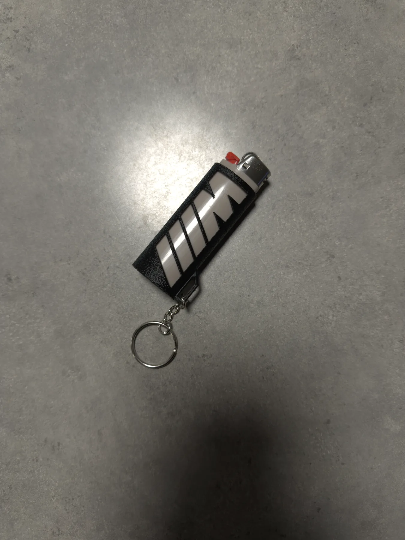 Raw camera reference photo of the BIC lighter case prototype angle 01
