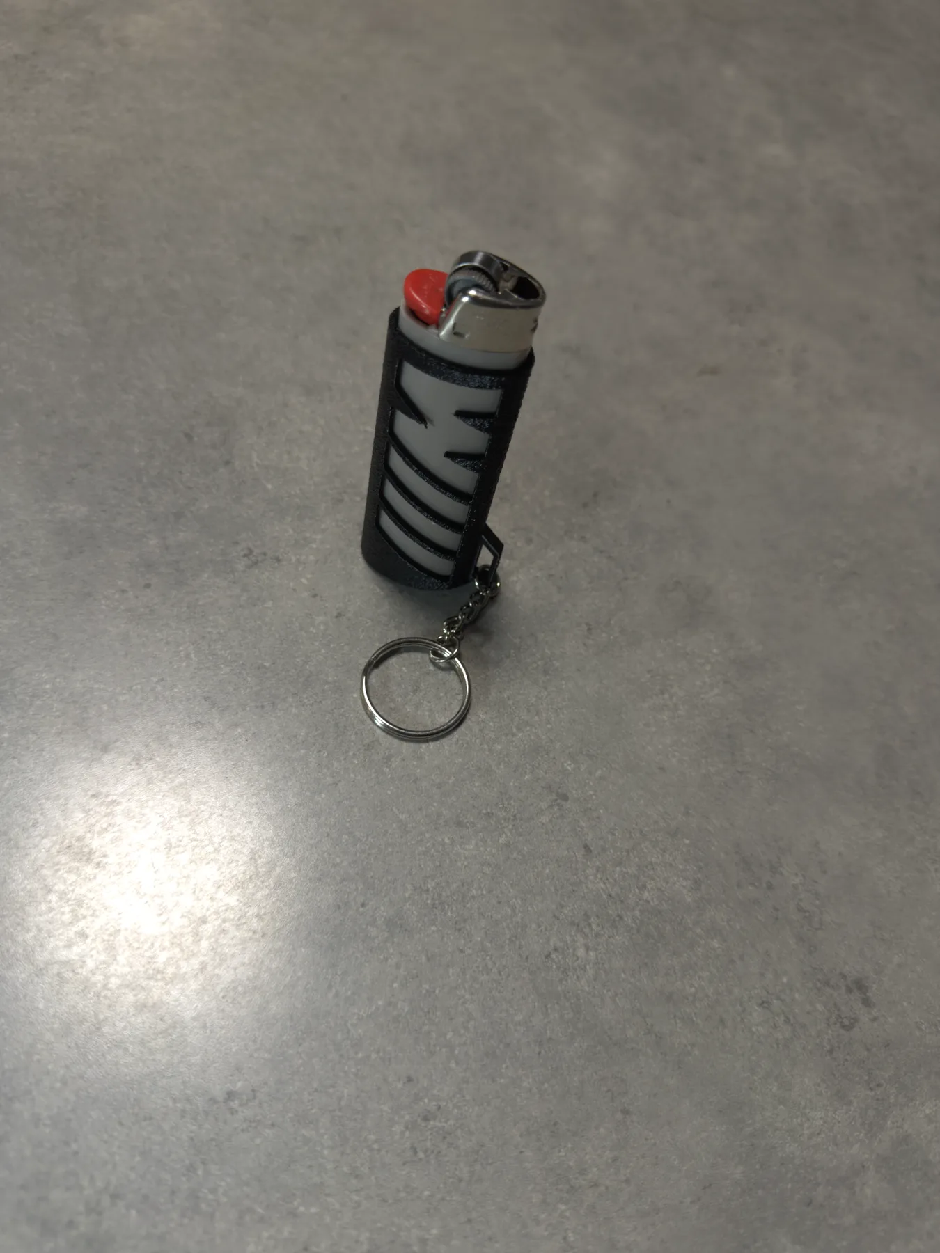 Raw camera reference photo of the BIC lighter case prototype angle 02