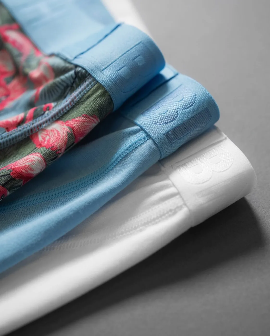 Close-up of the Flamingo Ethereal boxer brief and blue BN3TH waistband.