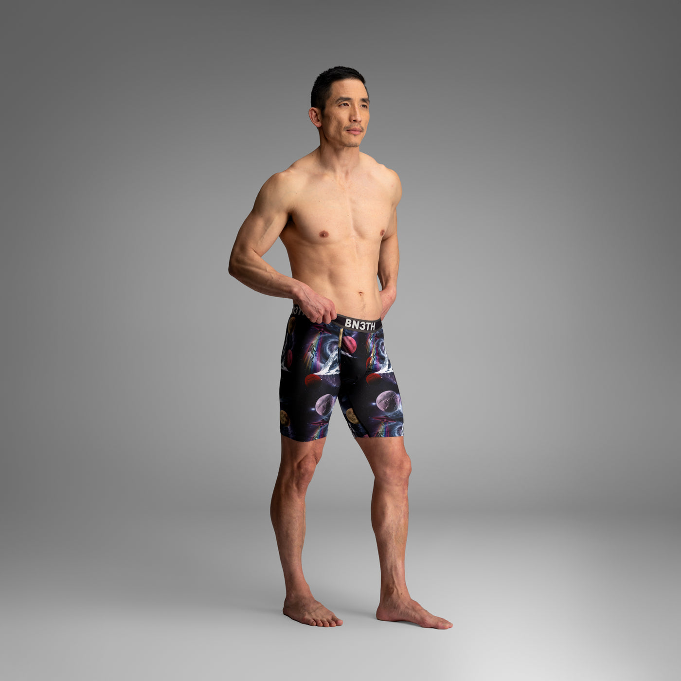 Model wearing the BN3TH FW26 boxer brief with the final space-inspired textile print.
