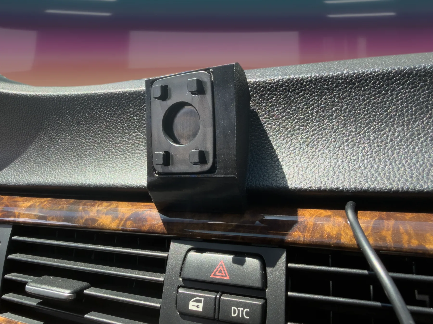 Close E90 mount shot with gradient windshield background