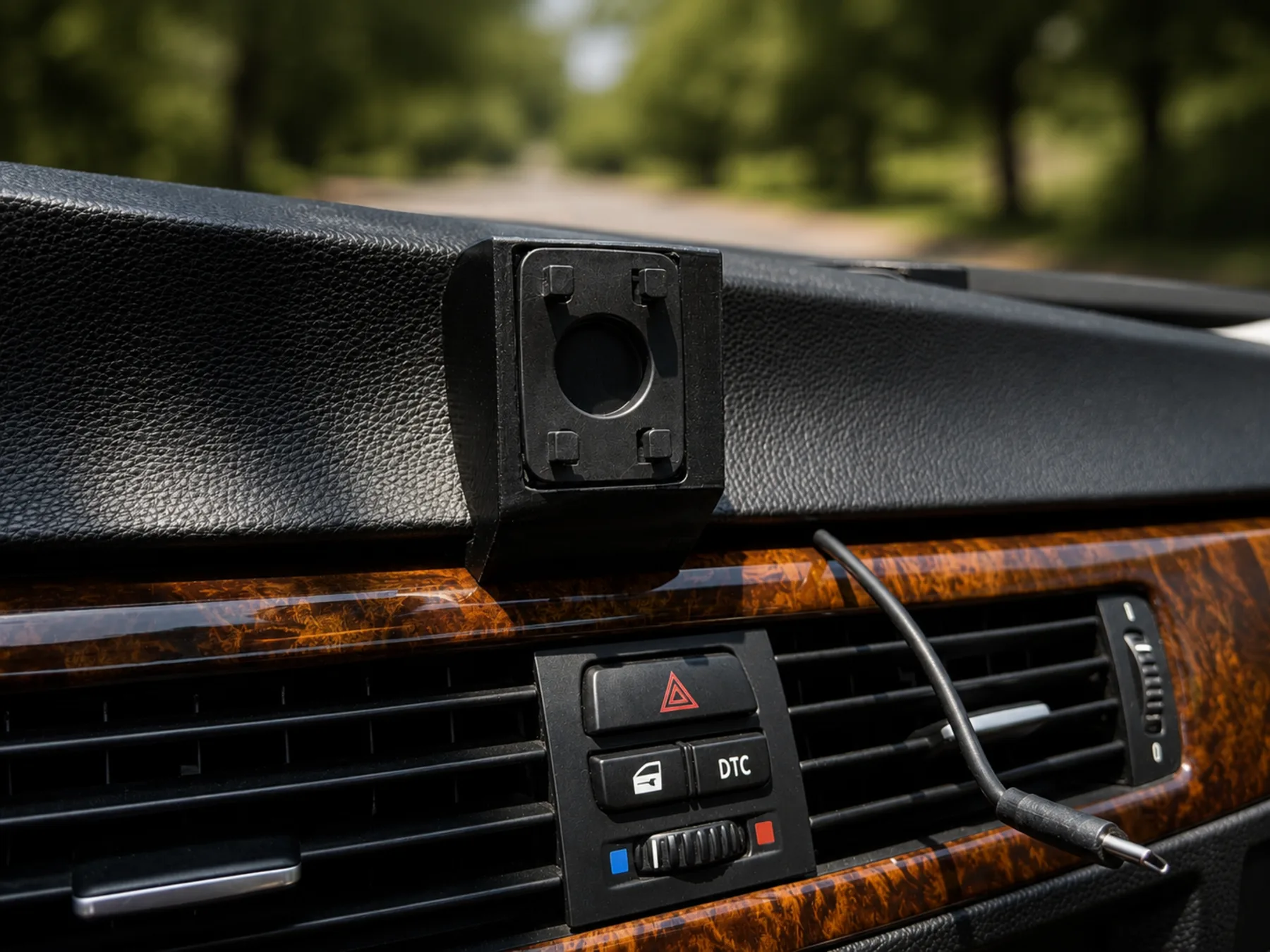 Rendered E90 CarPlay mount close view installed on dashboard