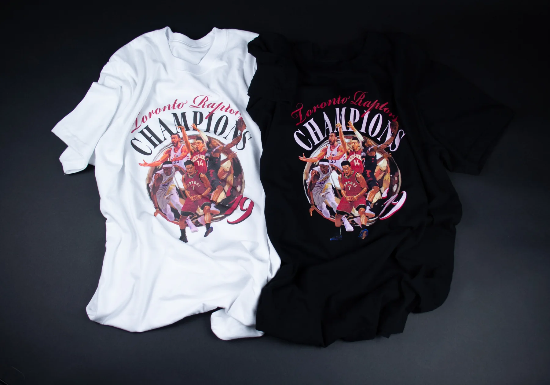 Raptors Championship black and white tee pair