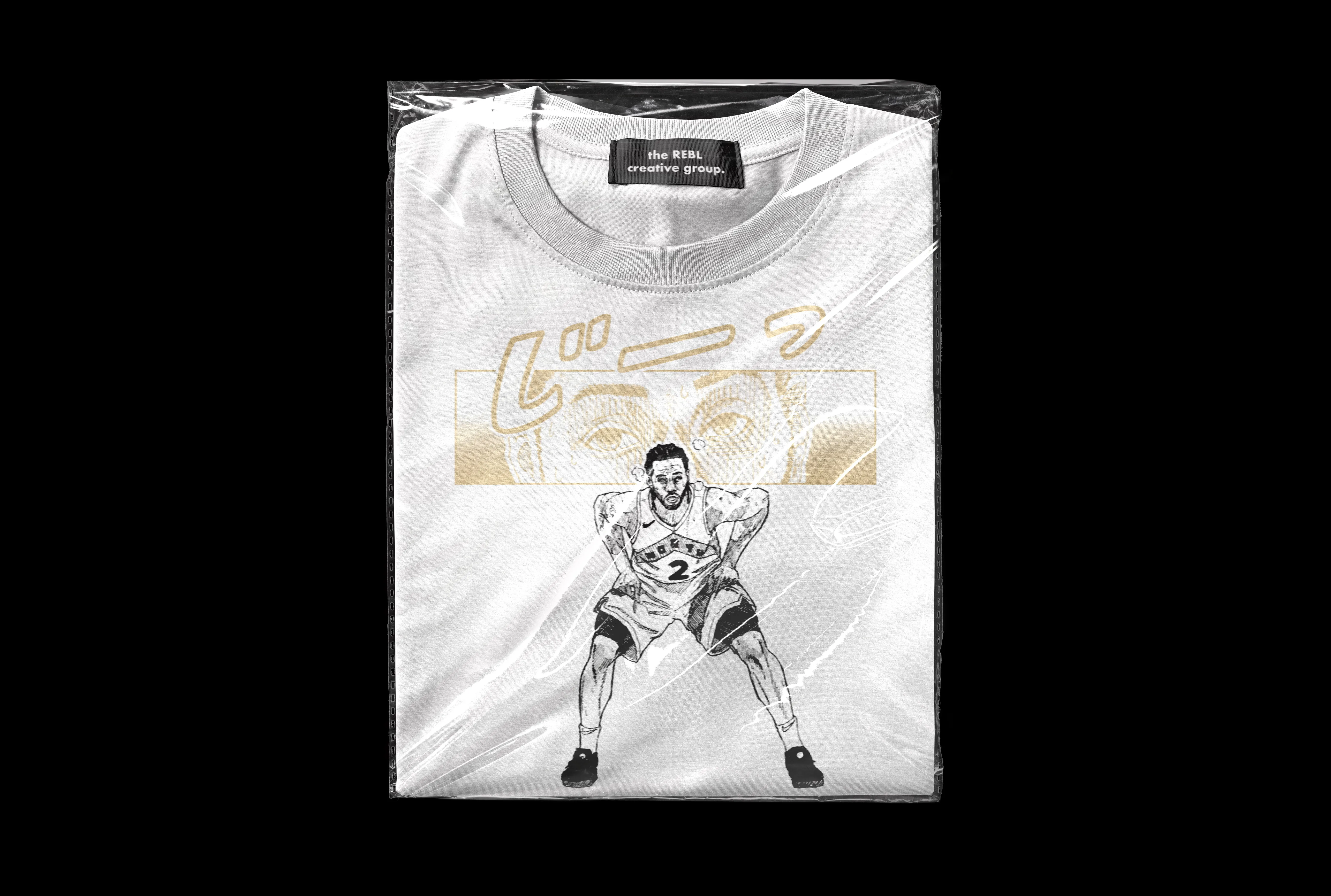 The Kawhi Tee folded and packaged against a black background