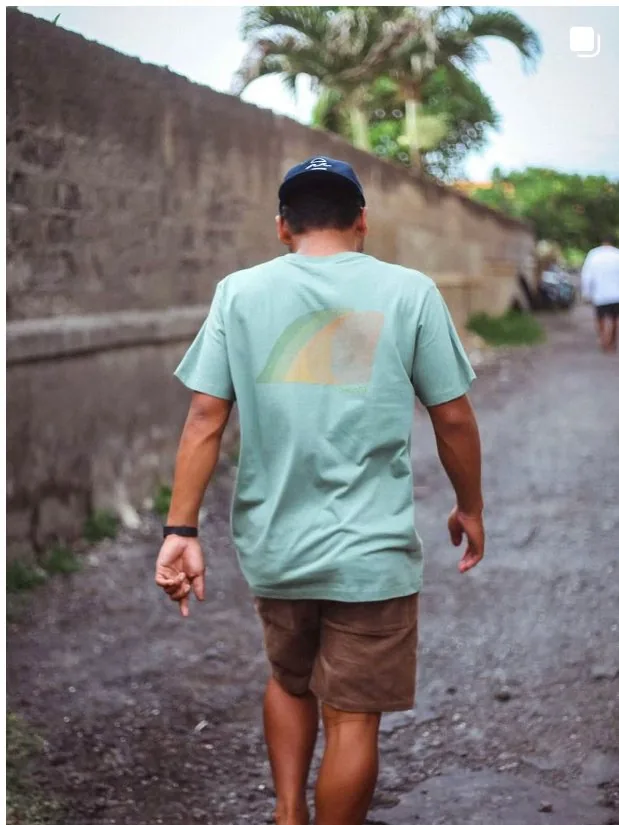 Rutopia lifestyle product image showing a person walking in a branded shirt.